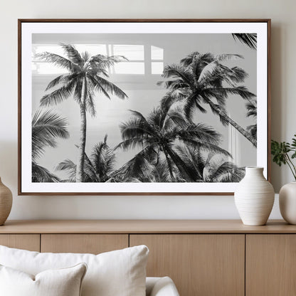 Black and white canvas of tall palm trees in moody tones, perfect for modern tropical minimalist or coastal-style home decor.