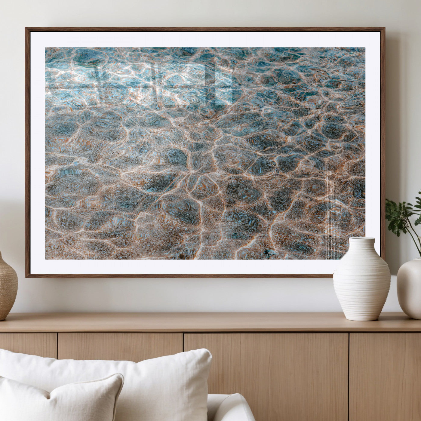Close-up of sunlit ocean ripples with aqua blue and golden tones, ideal for modern coastal or minimalist home decor.
