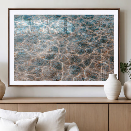 Close-up of sunlit ocean ripples with aqua blue and golden tones, ideal for modern coastal or minimalist home decor.