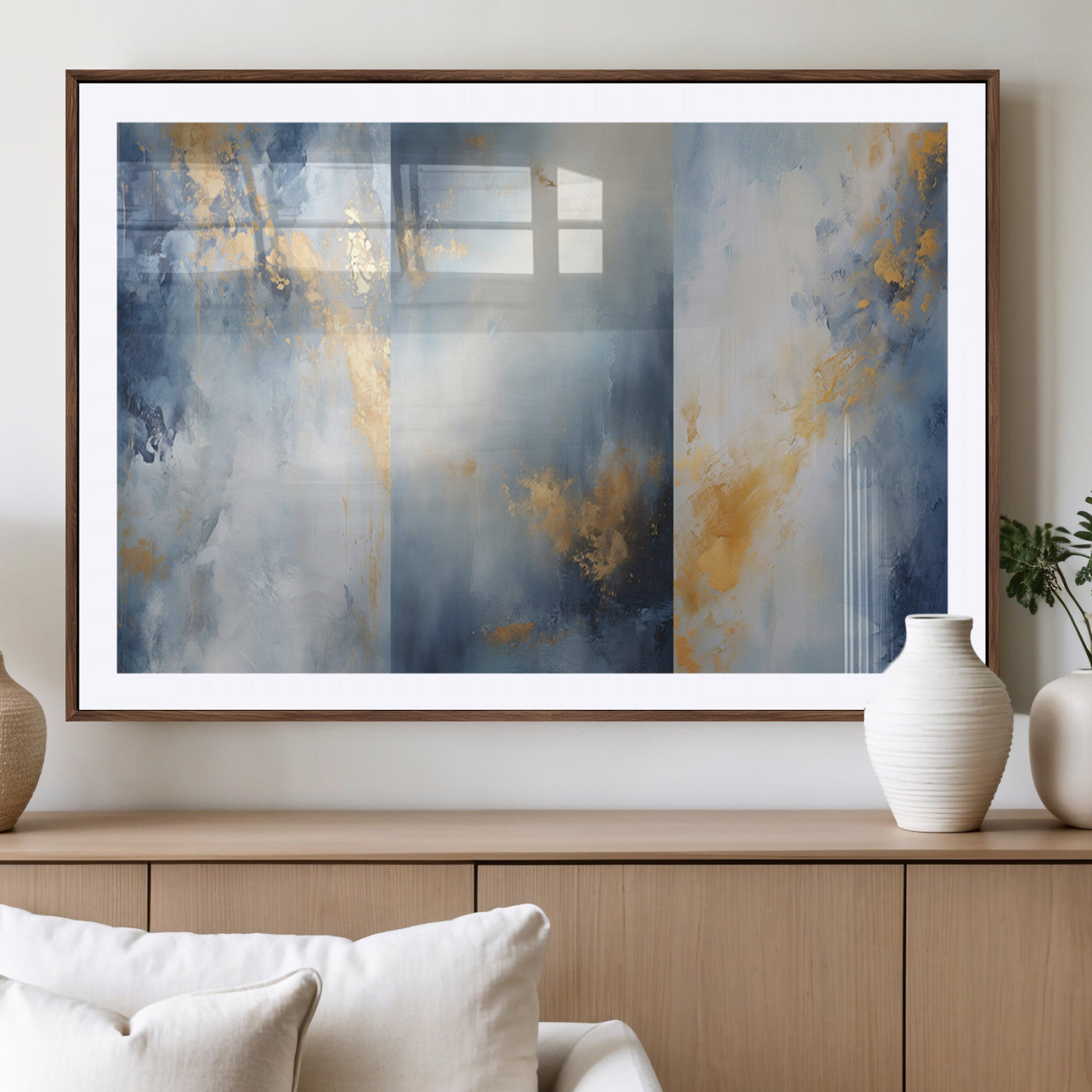 Abstract canvas art in soft blue and gold tones with textured brushstrokes, ideal for elegant or modern neutral decor spaces.