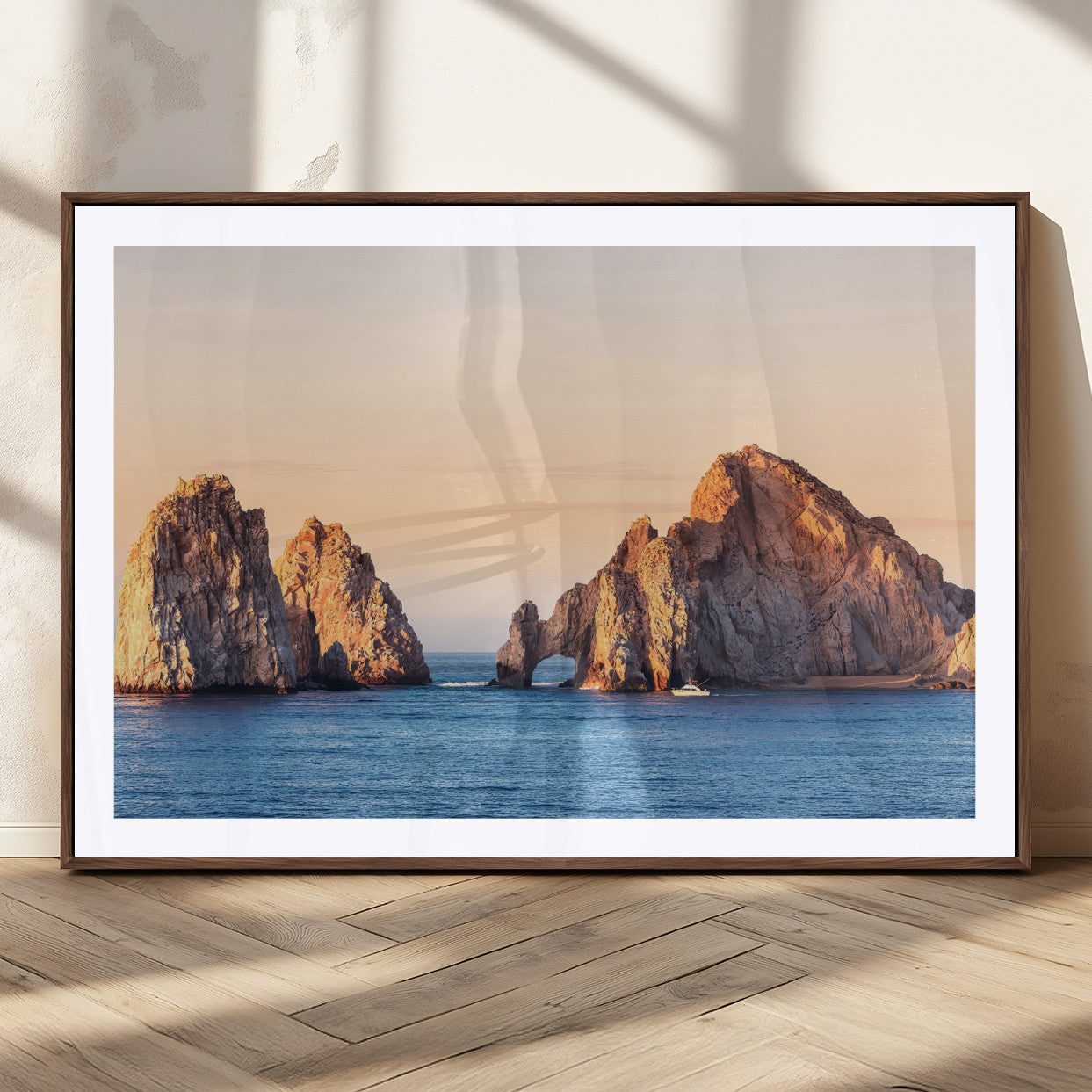 Framed canvas of El Arco rock formation in Cabo San Lucas at golden hour, ideal for coastal landmark or ocean-inspired decor.