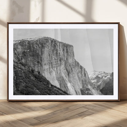 Monochrome canvas of El Capitan’s granite wall in Yosemite with snowy peaks, ideal for dramatic mountain or black-and-white nature decor.