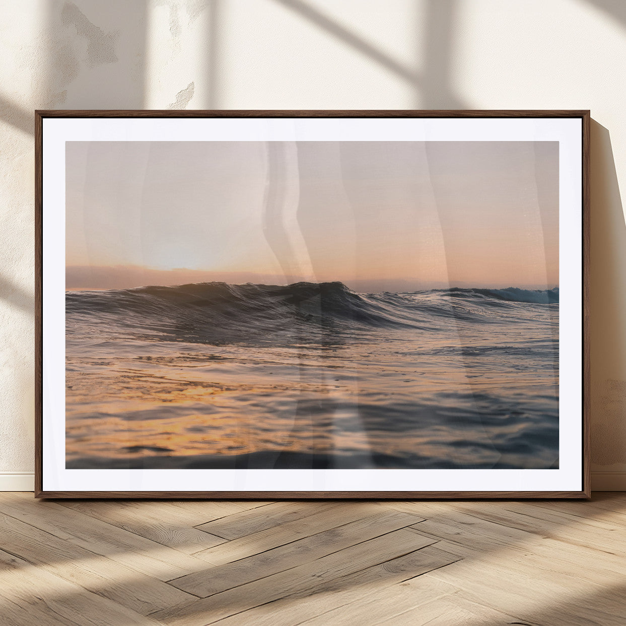 Framed canvas of ocean waves glowing in sunset light, ideal for golden hour calm or peaceful coastal-inspired wall decor.