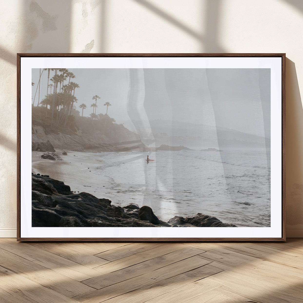 Framed canvas of a surfer in misty coastal tones at a foggy California beach, ideal for minimalist coastal beach or serene ocean-themed decor.