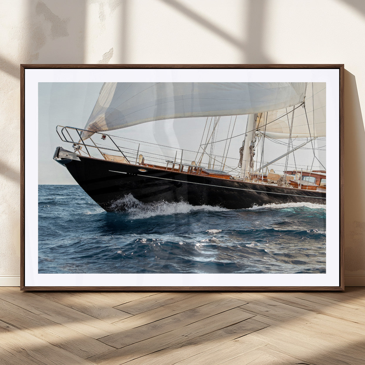 Close-up of a classic sailing yacht with wooden deck and full sails, perfect for nautical or coastal-style decor in ocean-themed spaces.
