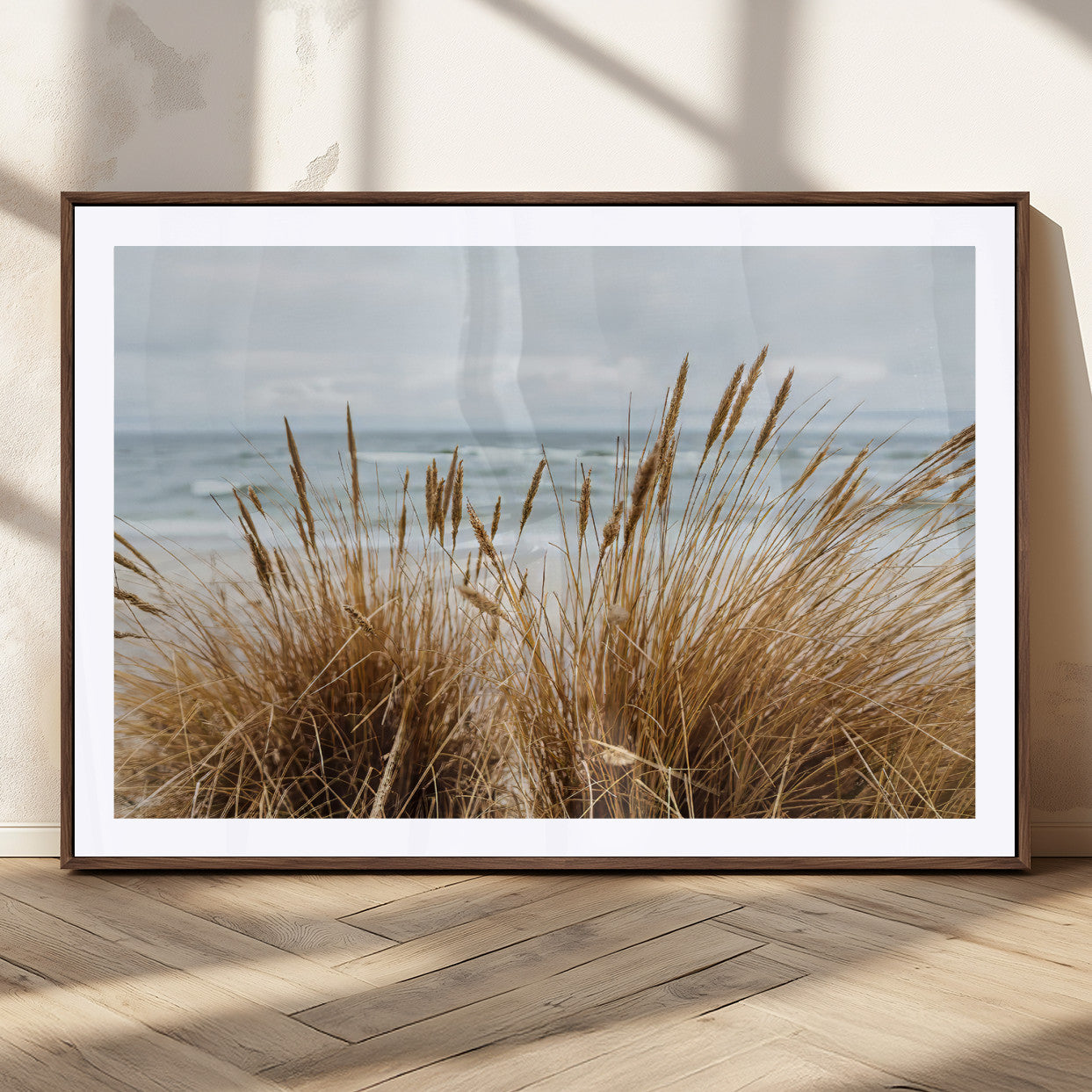 Canvas of golden beach grass swaying by the ocean under a soft cloudy sky, perfect for neutral-toned or coastal minimalist decor.