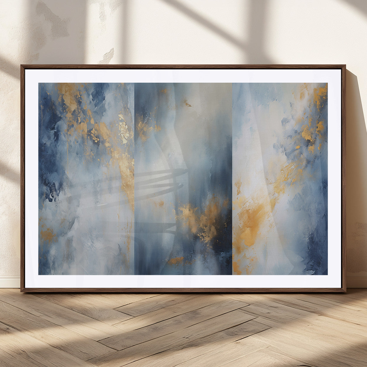 Abstract canvas art in soft blue and gold tones with textured brushstrokes, ideal for elegant or modern neutral decor spaces.