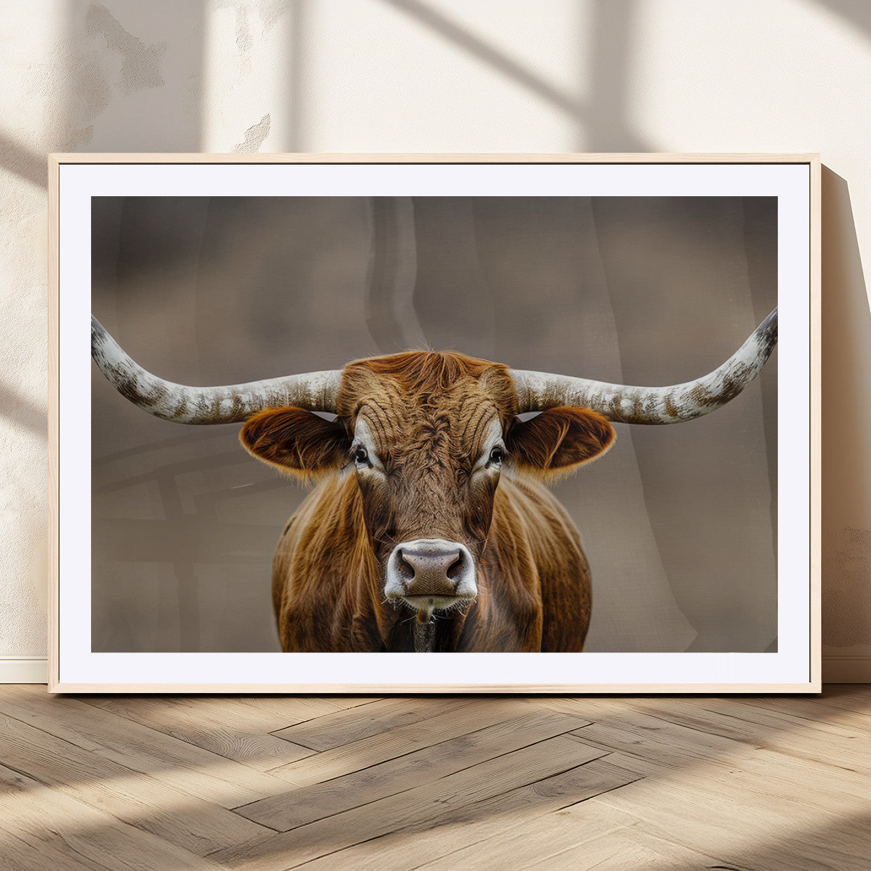 Close-up of a Texas Longhorn with strong curved horns and warm brown tones, perfect for rustic or western-style wall decor.