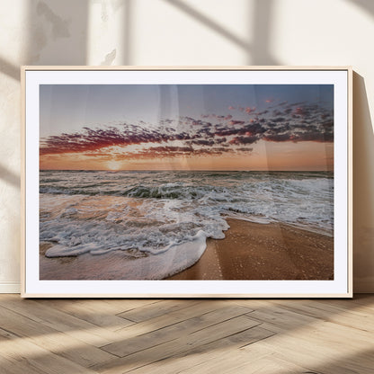 Canvas of a sunset over a foamy ocean shore with warm light and gentle waves, ideal for coastal or beach-themed home decor.
