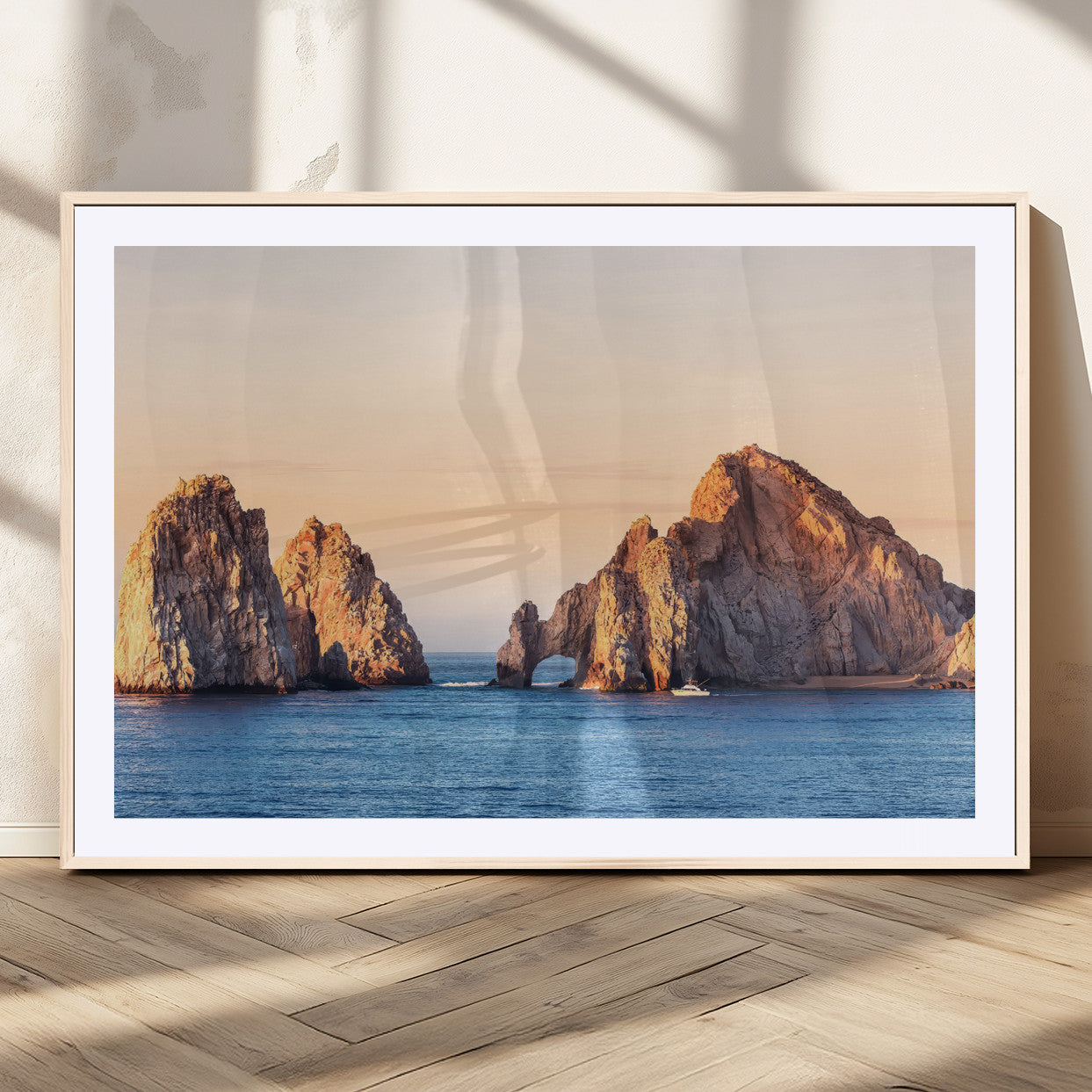 Framed canvas of El Arco rock formation in Cabo San Lucas at golden hour, ideal for coastal landmark or ocean-inspired decor.