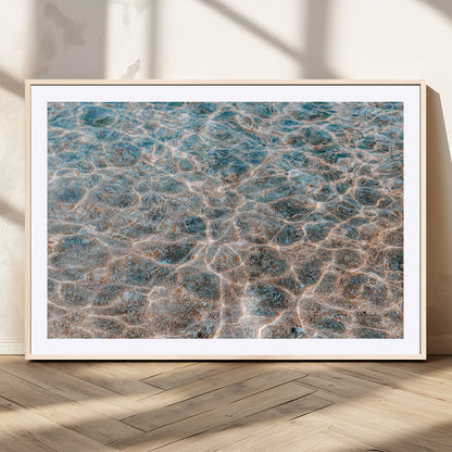 Close-up of sunlit ocean ripples with aqua blue and golden tones, ideal for modern coastal or minimalist home decor.