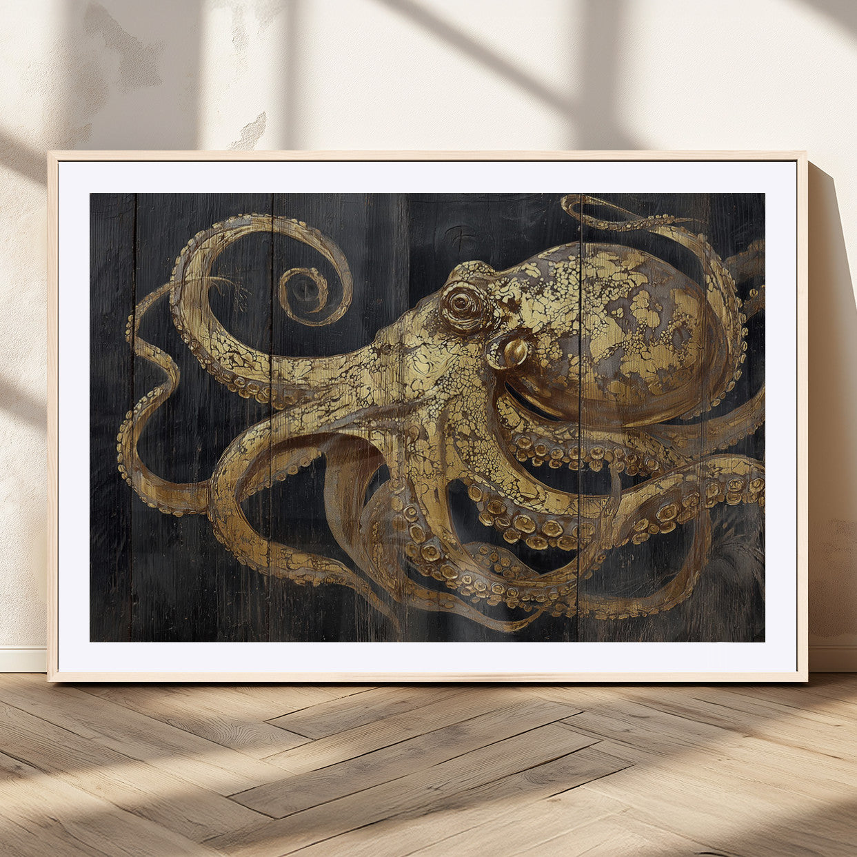 A detailed gold illustration of an octopus on black wooden planks, showing its intricate tentacles and textured skin in an artistic style.