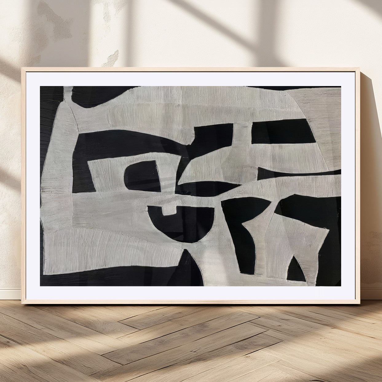 Minimalist black and white canvas featuring bold abstract textures and geometric shapes, ideal for modern neutral decor.