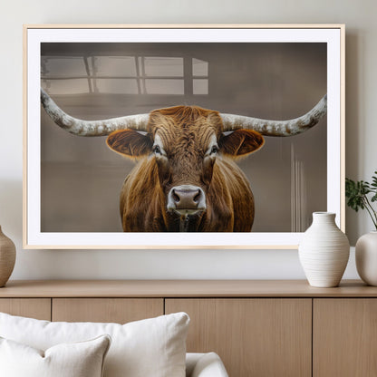 Close-up of a Texas Longhorn with strong curved horns and warm brown tones, perfect for rustic or western-style wall decor.