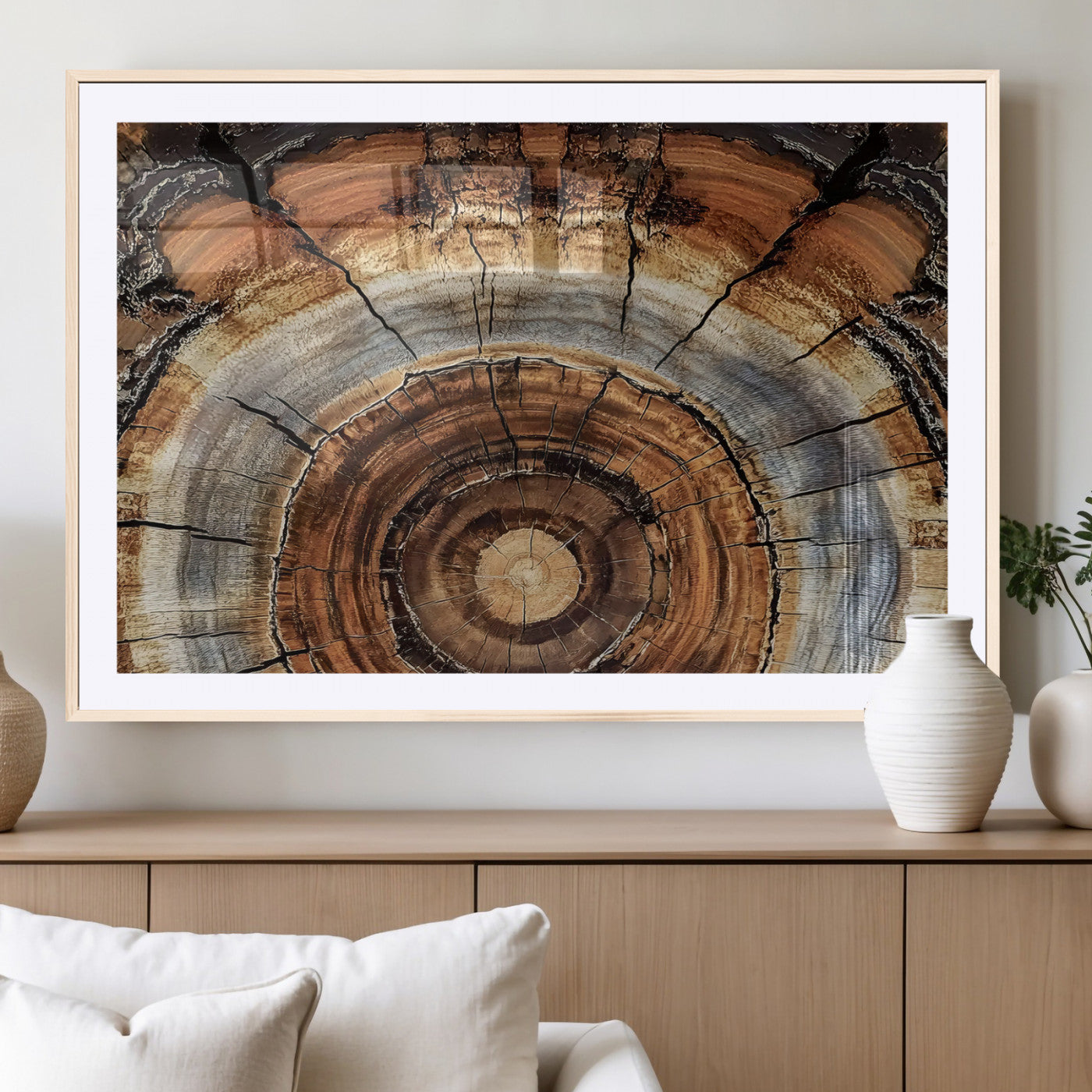 Canvas of tree rings and natural wood grain in earthy tones, ideal for rustic or vintage-inspired home decor with organic textures.
