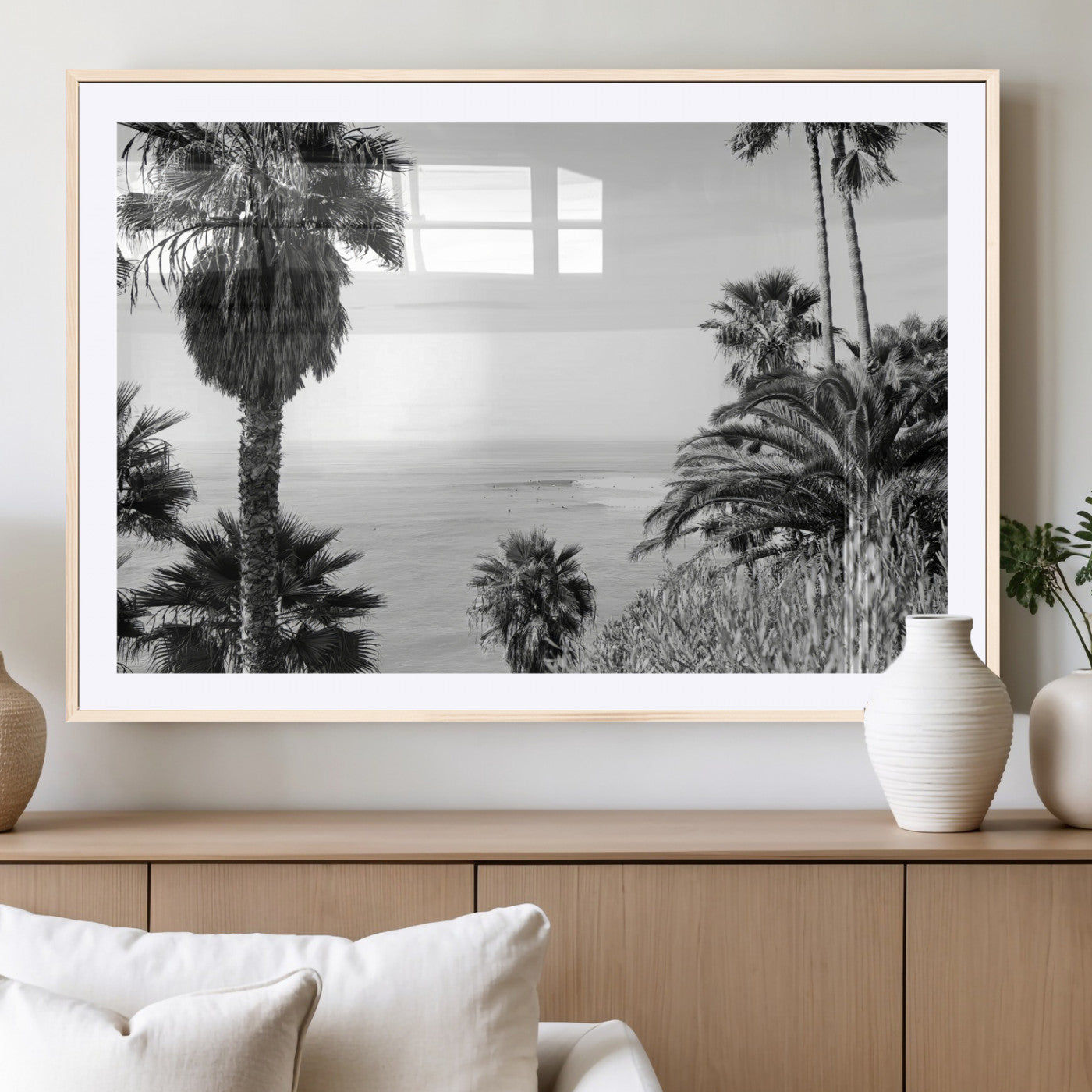 Monochrome canvas of palm trees framing a coastal surf scene, perfect for California-inspired or retro black-and-white beach decor.