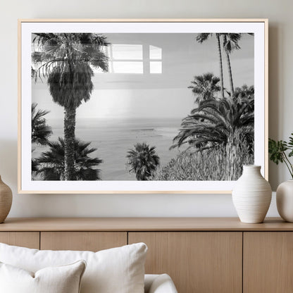 Monochrome canvas of palm trees framing a coastal surf scene, perfect for California-inspired or retro black-and-white beach decor.