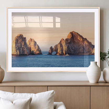 Framed canvas of El Arco rock formation in Cabo San Lucas at golden hour, ideal for coastal landmark or ocean-inspired decor.
