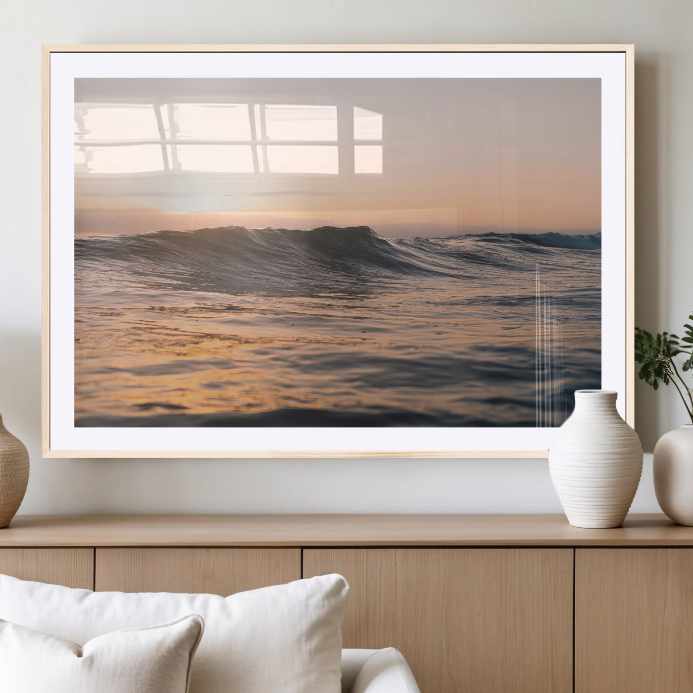 Framed canvas of ocean waves glowing in sunset light, ideal for golden hour calm or peaceful coastal-inspired wall decor.