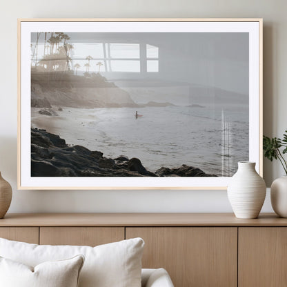 Framed canvas of a surfer in misty coastal tones at a foggy California beach, ideal for minimalist coastal beach or serene ocean-themed decor.