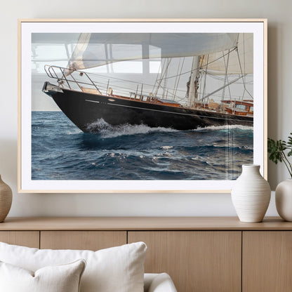 Close-up of a classic sailing yacht with wooden deck and full sails, perfect for nautical or coastal-style decor in ocean-themed spaces.