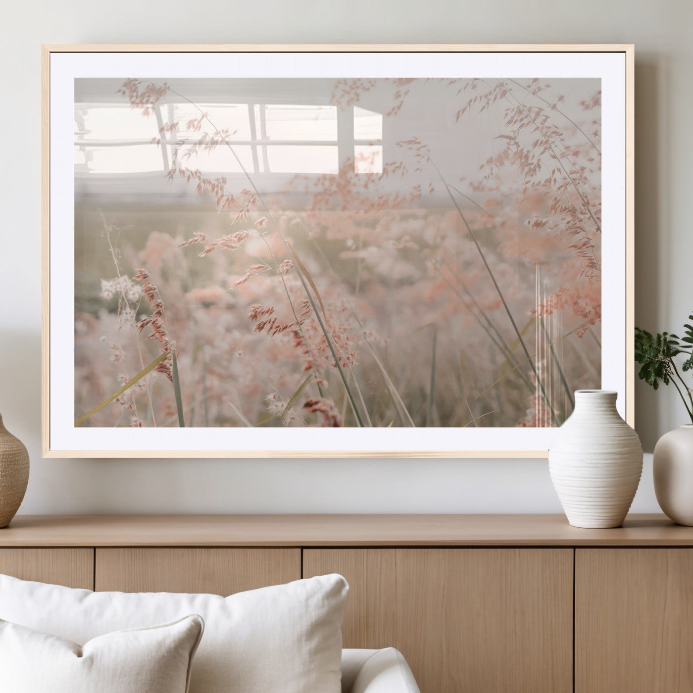 Soft pastel field with wild grasses in warm light, ideal for minimal nature or airy countryside-inspired interior wall decoration.