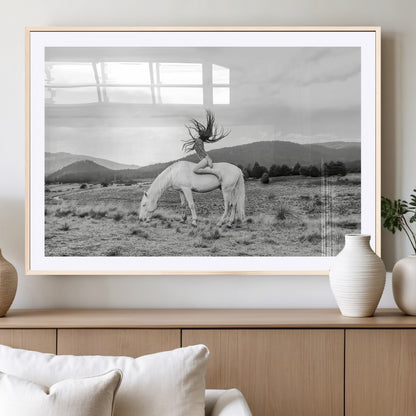 Black and white photo of a woman on a white horse in moody tones, ideal for Western Boho or modern rustic-style home decor.
