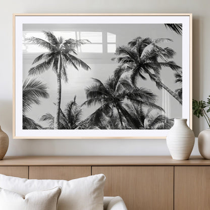 Black and white canvas of tall palm trees in moody tones, perfect for modern tropical minimalist or coastal-style home decor.