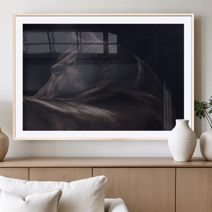 Close-up of a black horse with dramatic lighting on a dark background, perfect for rustic or masculine home decor.