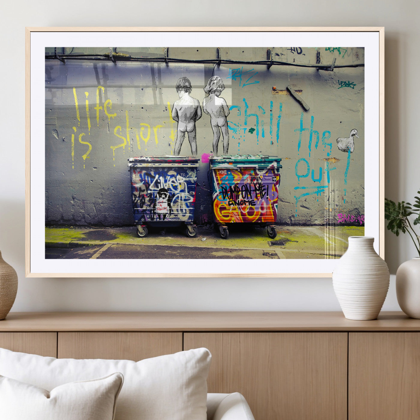 Graffiti-style canvas art with bold text and two naked figures over urban dumpsters, ideal for edgy or street-style decor.