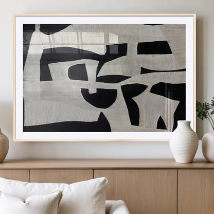 Minimalist black and white canvas featuring bold abstract textures and geometric shapes, ideal for modern neutral decor.