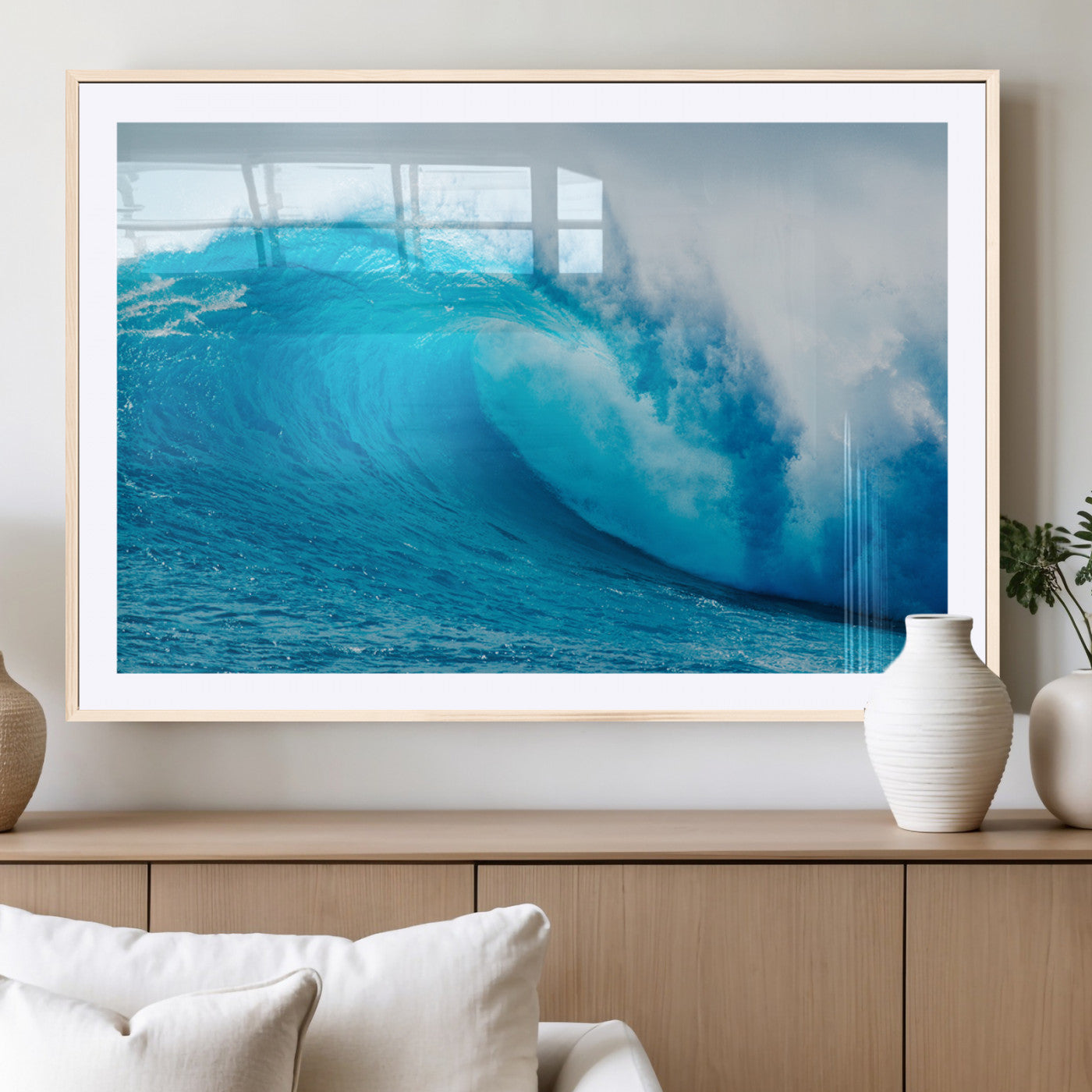 Vibrant canvas of a powerful curling ocean wave in tropical blue tones, perfect for coastal or surf-inspired decor settings.
