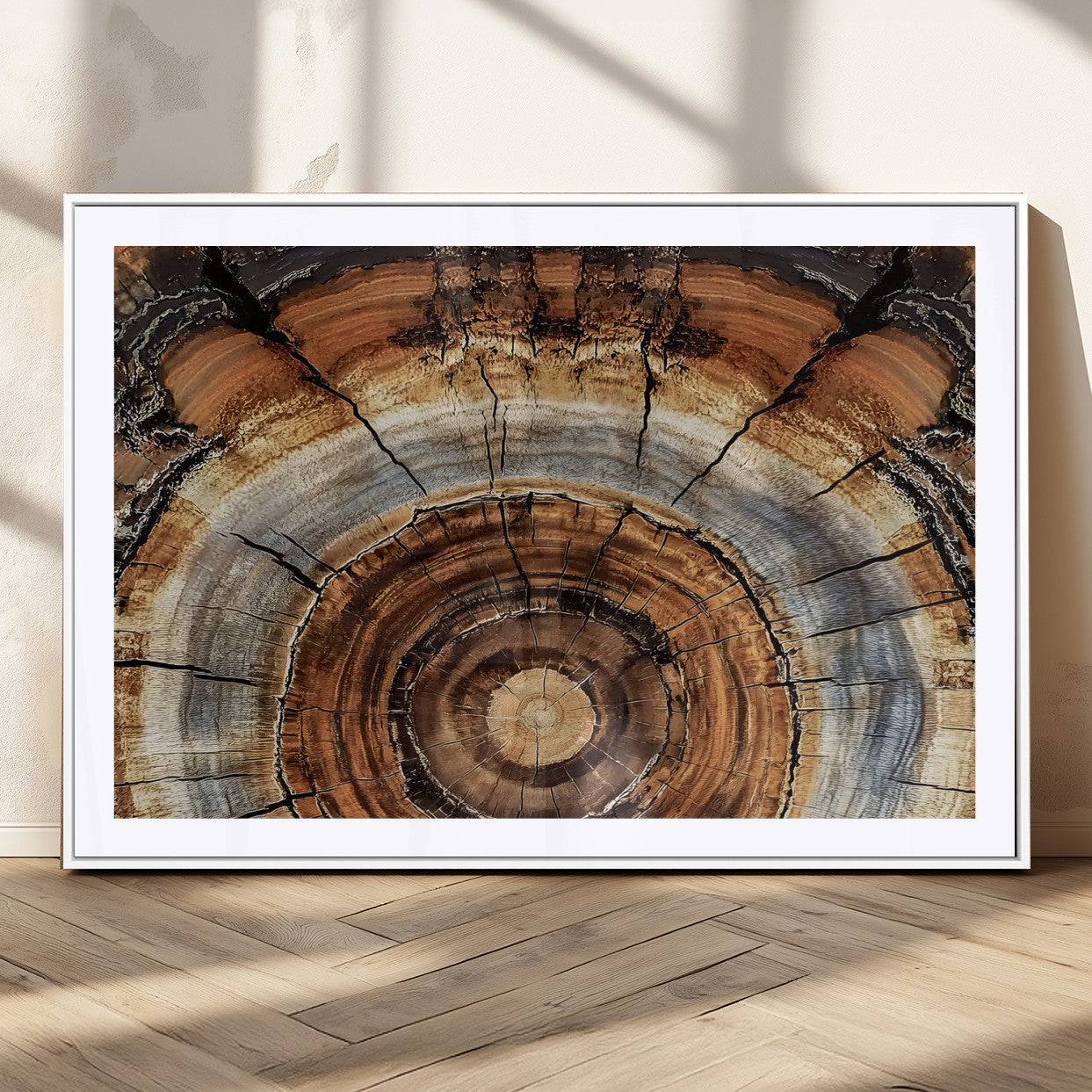 Canvas of tree rings and natural wood grain in earthy tones, ideal for rustic or vintage-inspired home decor with organic textures.