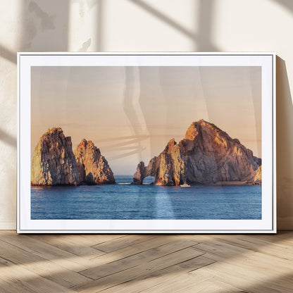 Framed canvas of El Arco rock formation in Cabo San Lucas at golden hour, ideal for coastal landmark or ocean-inspired decor.
