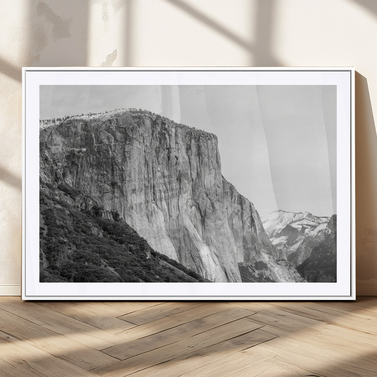 Monochrome canvas of El Capitan’s granite wall in Yosemite with snowy peaks, ideal for dramatic mountain or black-and-white nature decor.