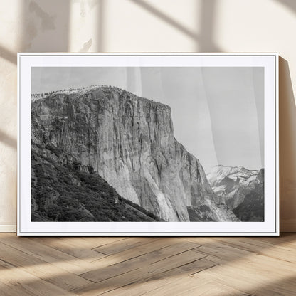 Monochrome canvas of El Capitan’s granite wall in Yosemite with snowy peaks, ideal for dramatic mountain or black-and-white nature decor.