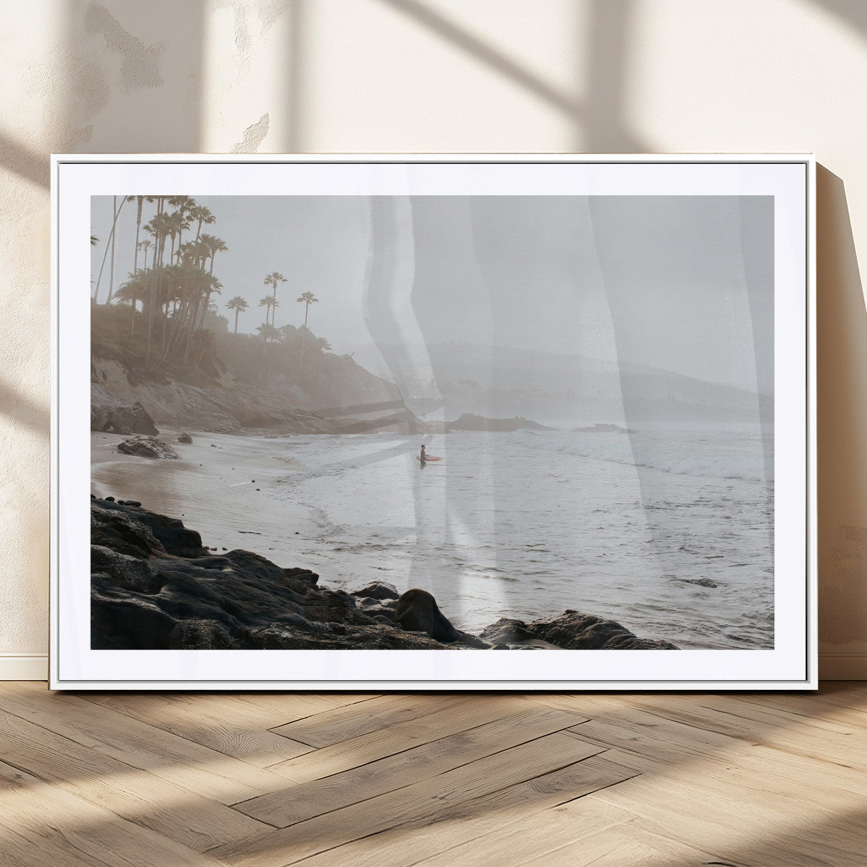 Framed canvas of a surfer in misty coastal tones at a foggy California beach, ideal for minimalist coastal beach or serene ocean-themed decor.