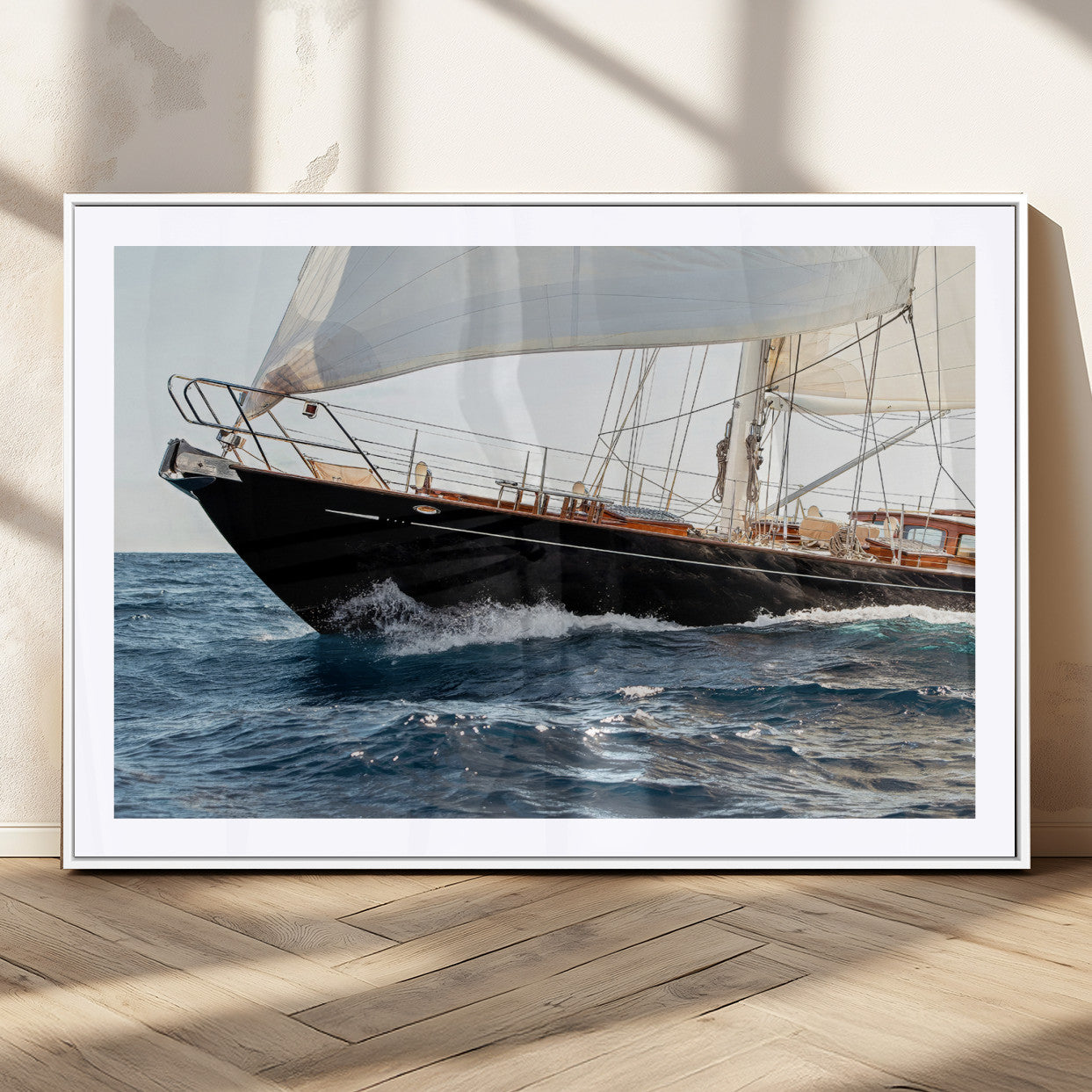 Close-up of a classic sailing yacht with wooden deck and full sails, perfect for nautical or coastal-style decor in ocean-themed spaces.