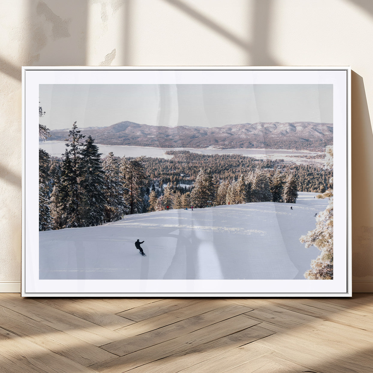 Canvas of a snowy mountain ski slope with pine trees and bright winter light, ideal for modern rustic or alpine-inspired home decor.