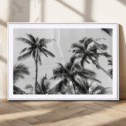 Black and white canvas of tall palm trees in moody tones, perfect for modern tropical minimalist or coastal-style home decor.
