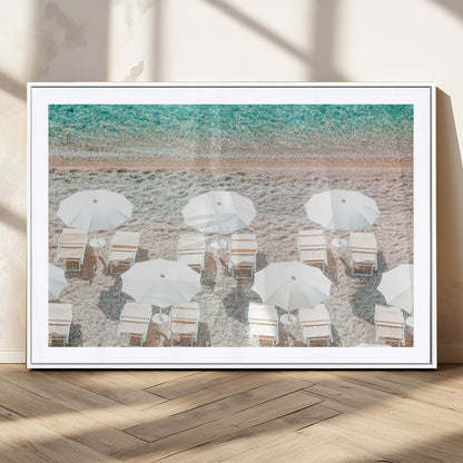 A bright beach scene with white umbrellas, pastel sand, and turquoise waters, creating a tranquil coastal vibe, perfect for beach house or summer decor.