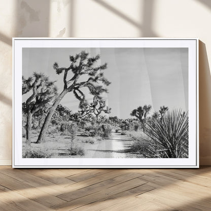 Canvas of a Joshua Tree forest in black and white tones, featuring a desert path and spiky vegetation, ideal for minimalist or rustic decor.