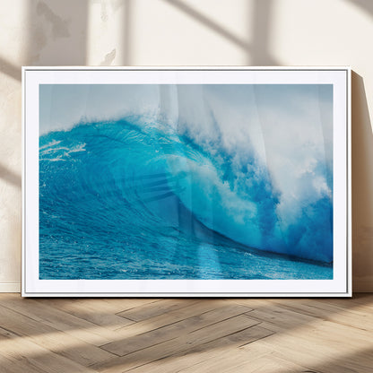 Vibrant canvas of a powerful curling ocean wave in tropical blue tones, perfect for coastal or surf-inspired decor settings.
