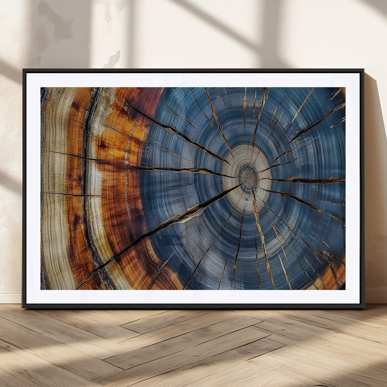A stunning close-up view of a tree trunk, showcasing the intricate growth rings in a vibrant mix of warm browns, cool blues, and hints of natural texture.