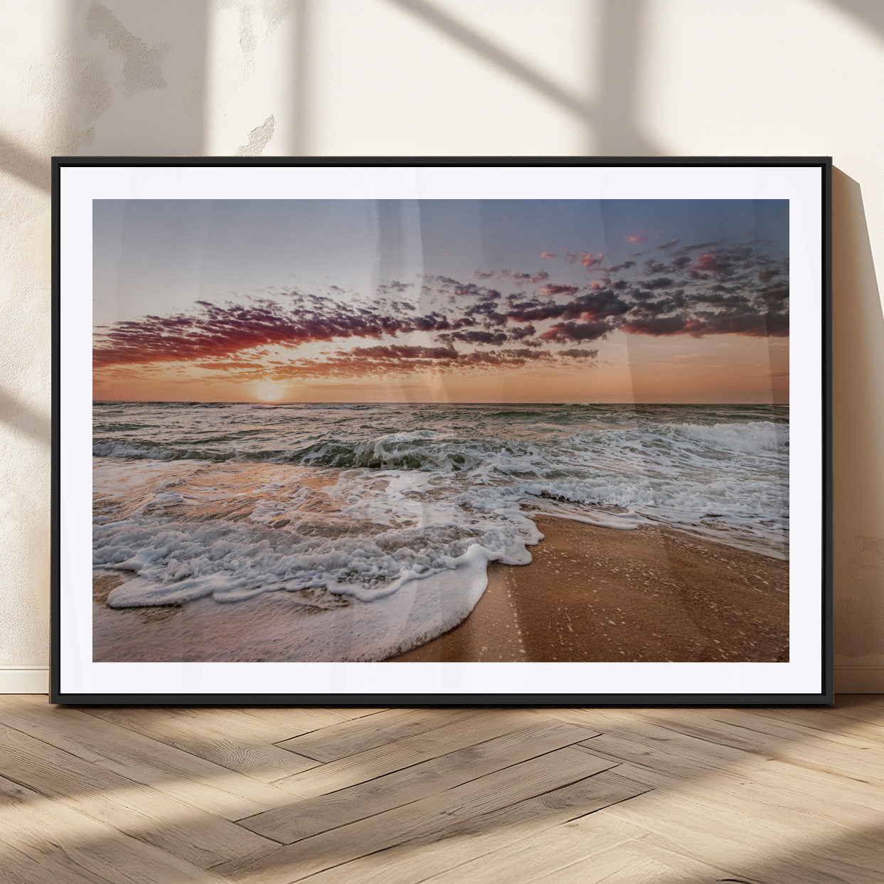 Canvas of a sunset over a foamy ocean shore with warm light and gentle waves, ideal for coastal or beach-themed home decor.