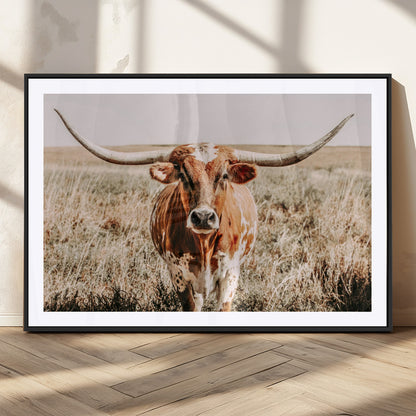 Framed longhorn cow canvas wall art with rustic prairie background, western animal print perfect for farmhouse or ranch style decor
