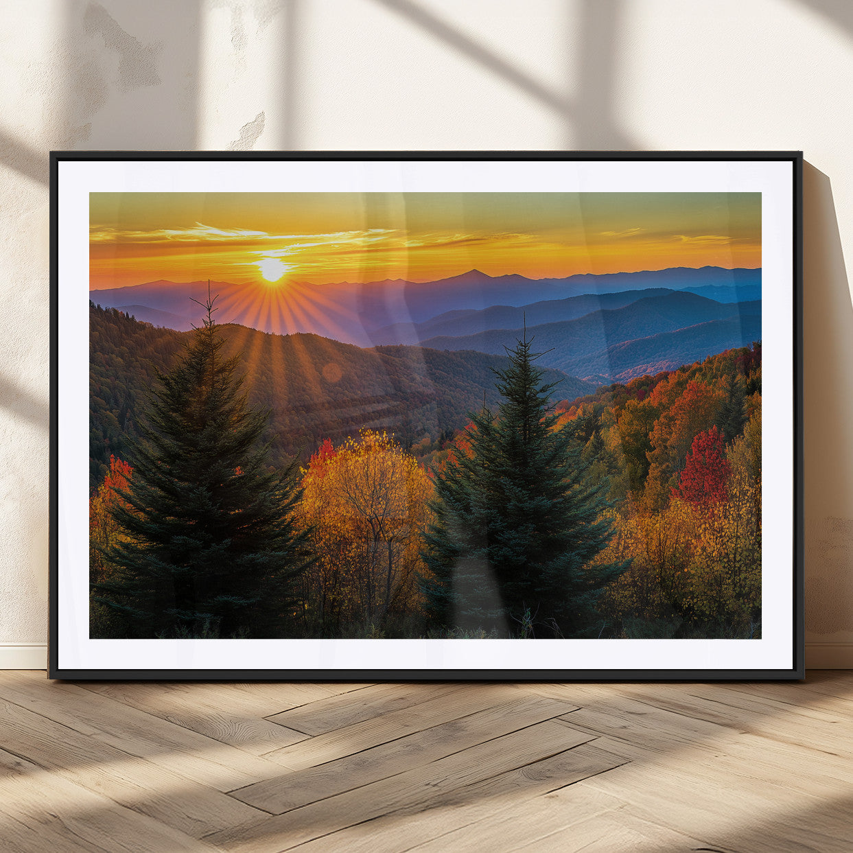 Vibrant sunset over autumn mountains with colorful trees and warm light, ideal for nature lovers or cabin-style wall decor.