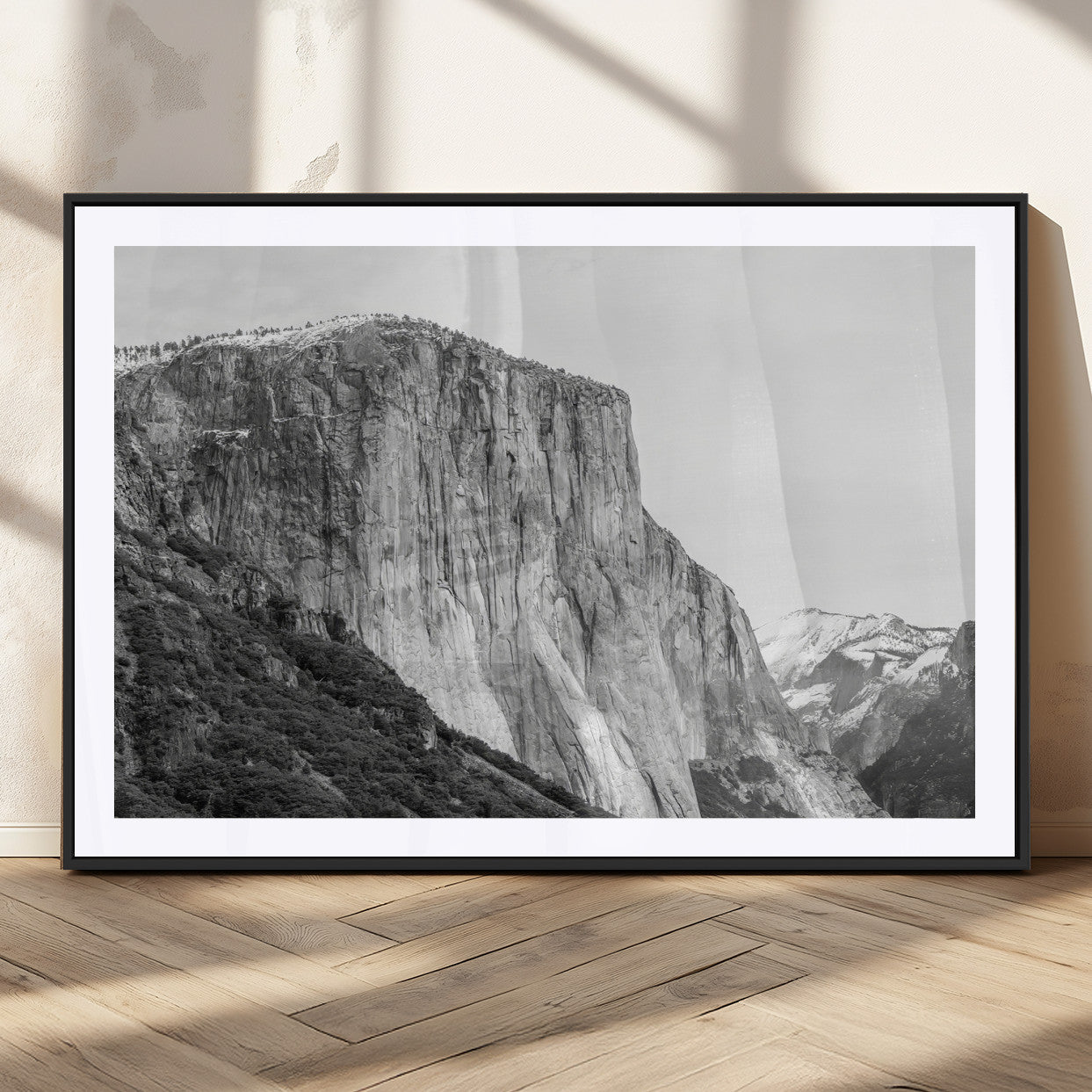 Monochrome canvas of El Capitan’s granite wall in Yosemite with snowy peaks, ideal for dramatic mountain or black-and-white nature decor.