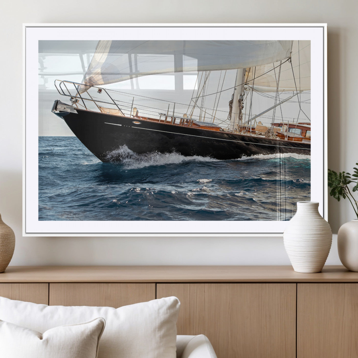 Close-up of a classic sailing yacht with wooden deck and full sails, perfect for nautical or coastal-style decor in ocean-themed spaces.
