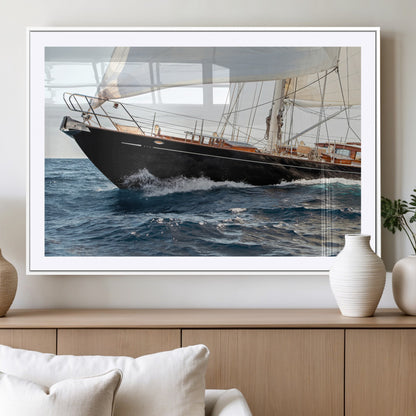 Close-up of a classic sailing yacht with wooden deck and full sails, perfect for nautical or coastal-style decor in ocean-themed spaces.